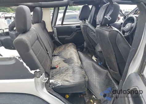 2012 Jeep Wrangler Unlimited Sport z USA, uszkodzony, nr VIN 1C4BJWDG2CL201207